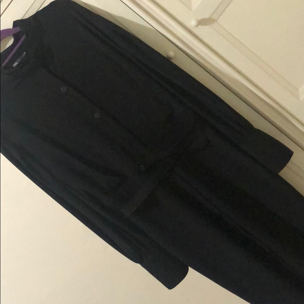 Button down high collar belted dress.